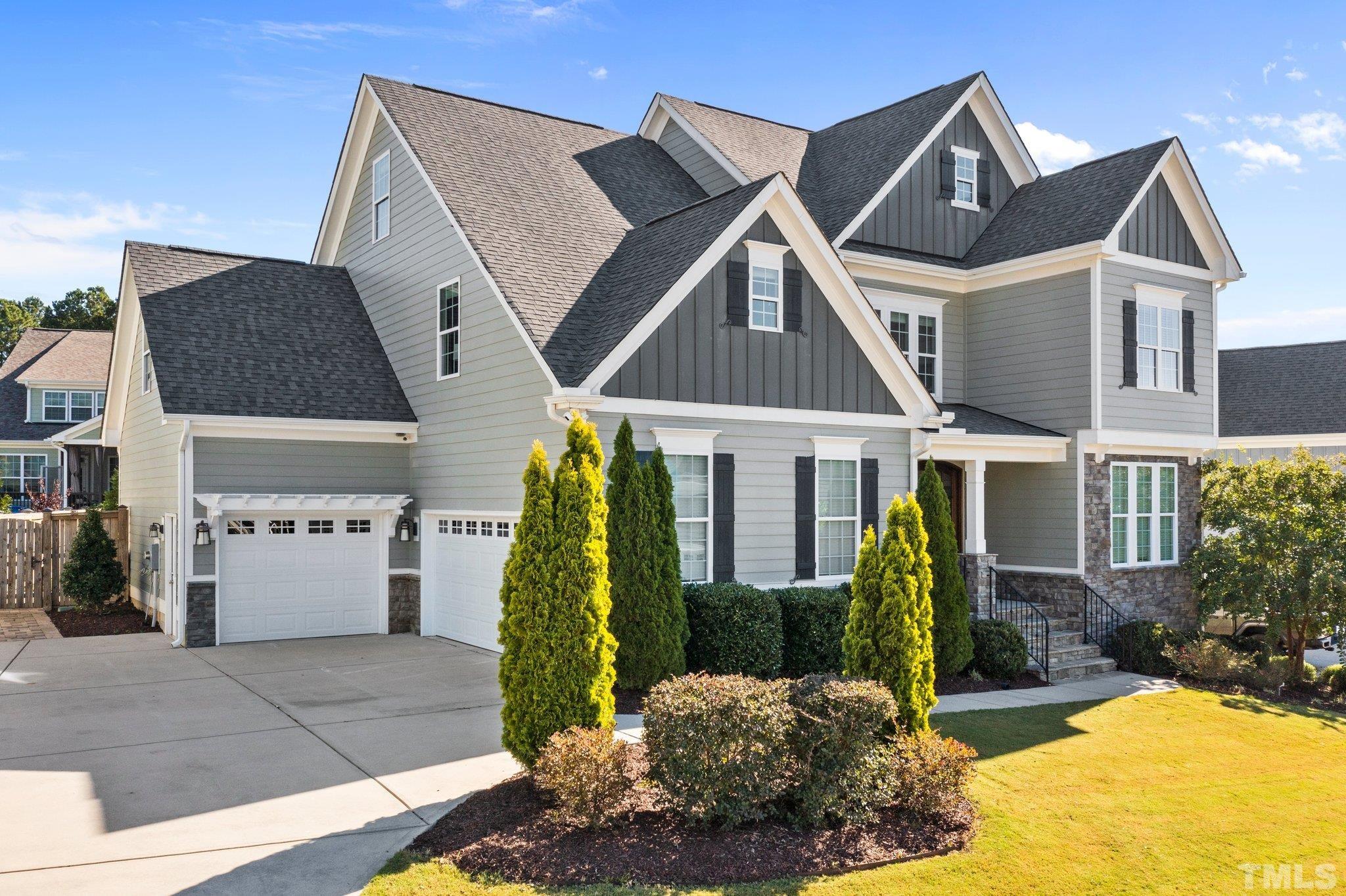 2830 Riley's Pond Drive Apex, NC 27502 - Photo 6 of 54 a front view of a house with a yard