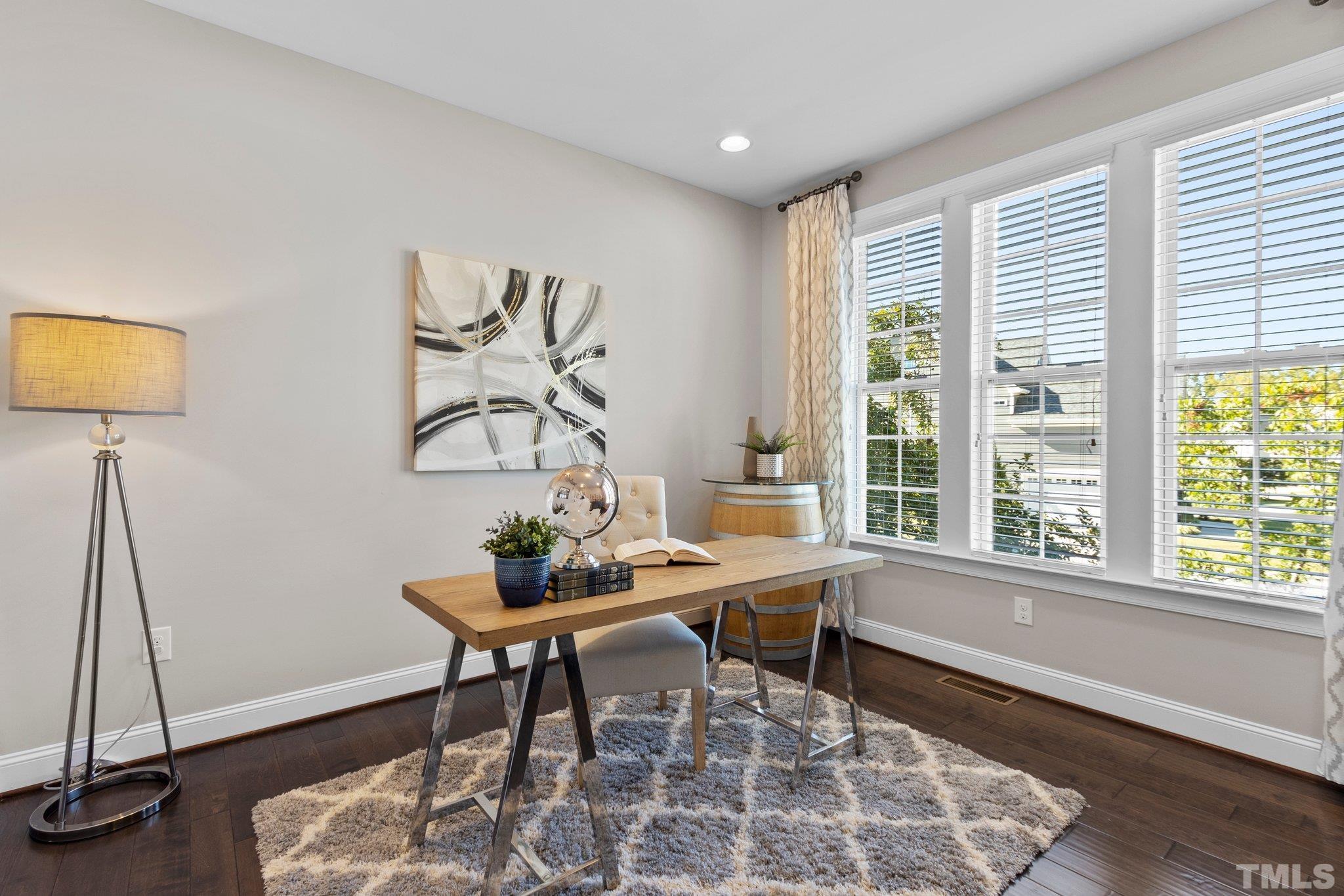 2830 Riley's Pond Drive Apex, NC 27502 - Photo 8 of 54 a dining room with furniture and a window
