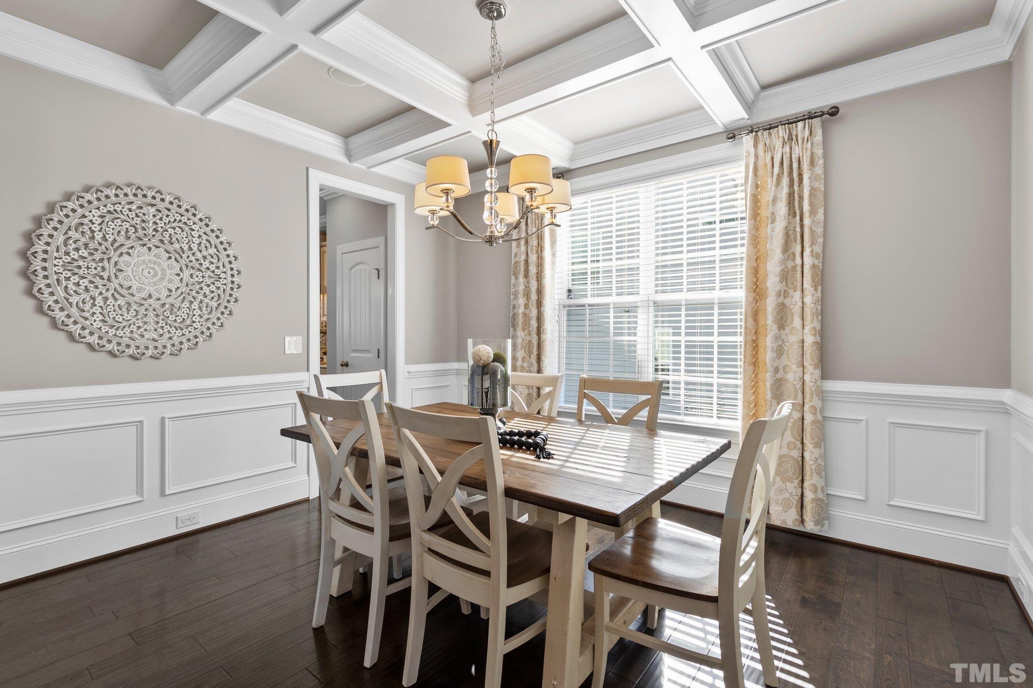 2830 Riley's Pond Drive Apex, NC 27502 - Photo 10 of 54 a view of a dining room with furniture and wooden floor