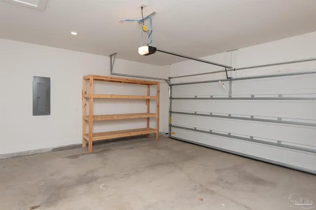 a view of an empty room and fire place