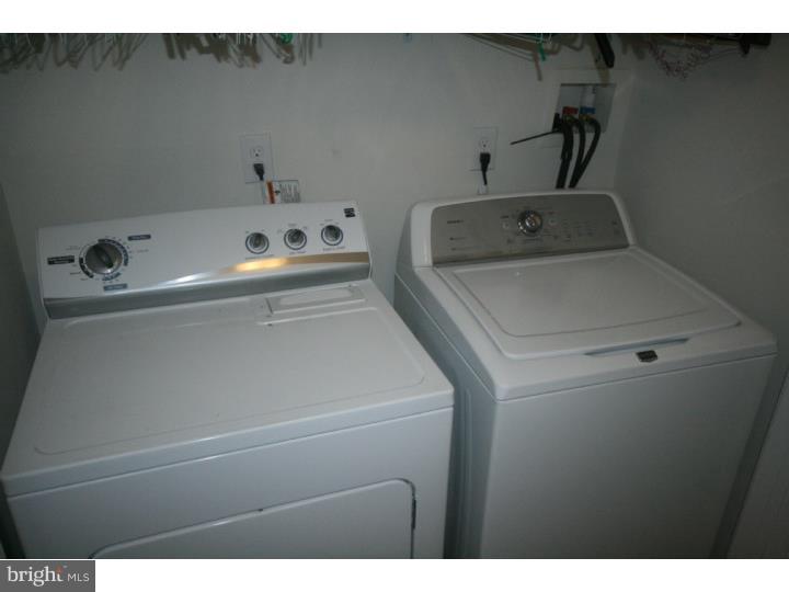 474 Aura Road Mullica Hill, NJ 08062 - Photo 20 of 21 a utility room with dryer and washer