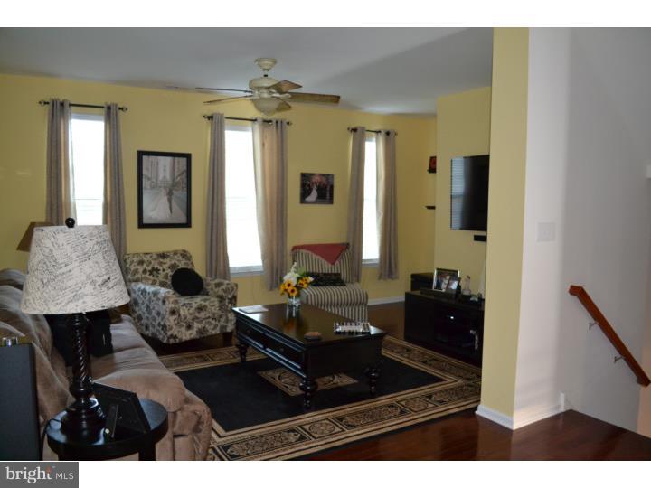474 Aura Road Mullica Hill, NJ 08062 - Photo 5 of 21 a living room with furniture and a window