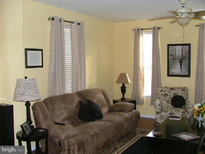 474 Aura Road Mullica Hill, NJ 08062 - Photo 6 of 21 a living room with furniture and a window