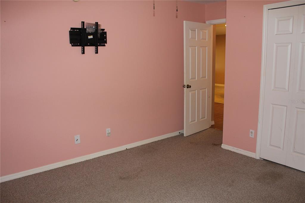7238 Evergreen Loop Polk City, FL 33868 - Photo 13 of 28 an empty room with a empty space