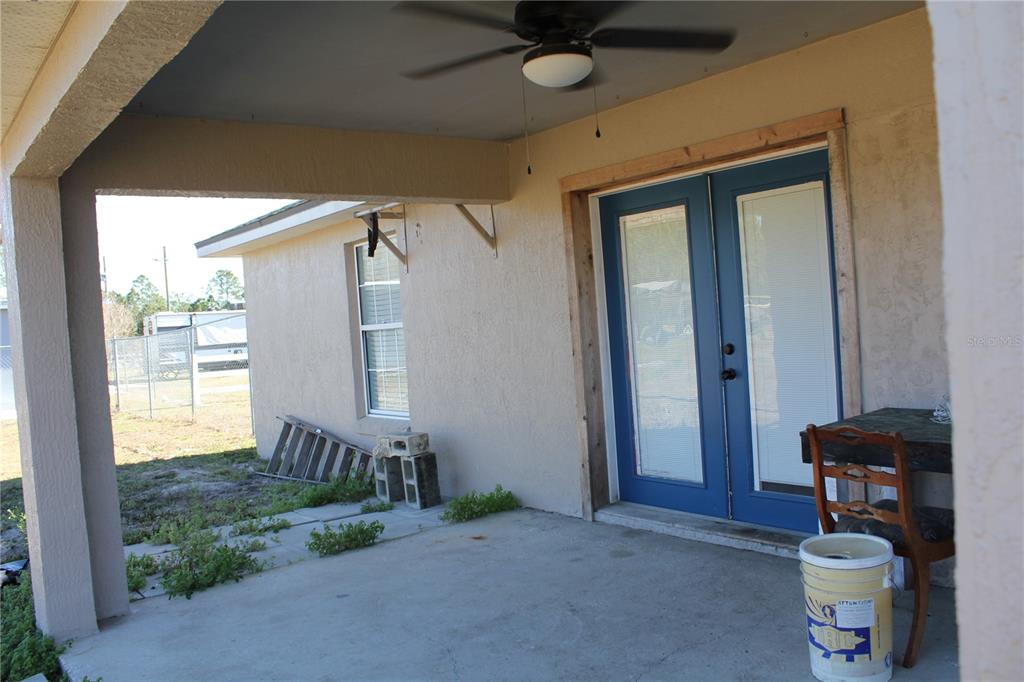 7238 Evergreen Loop Polk City, FL 33868 - Photo 28 of 28 a view of a room that has a window and wooden floor