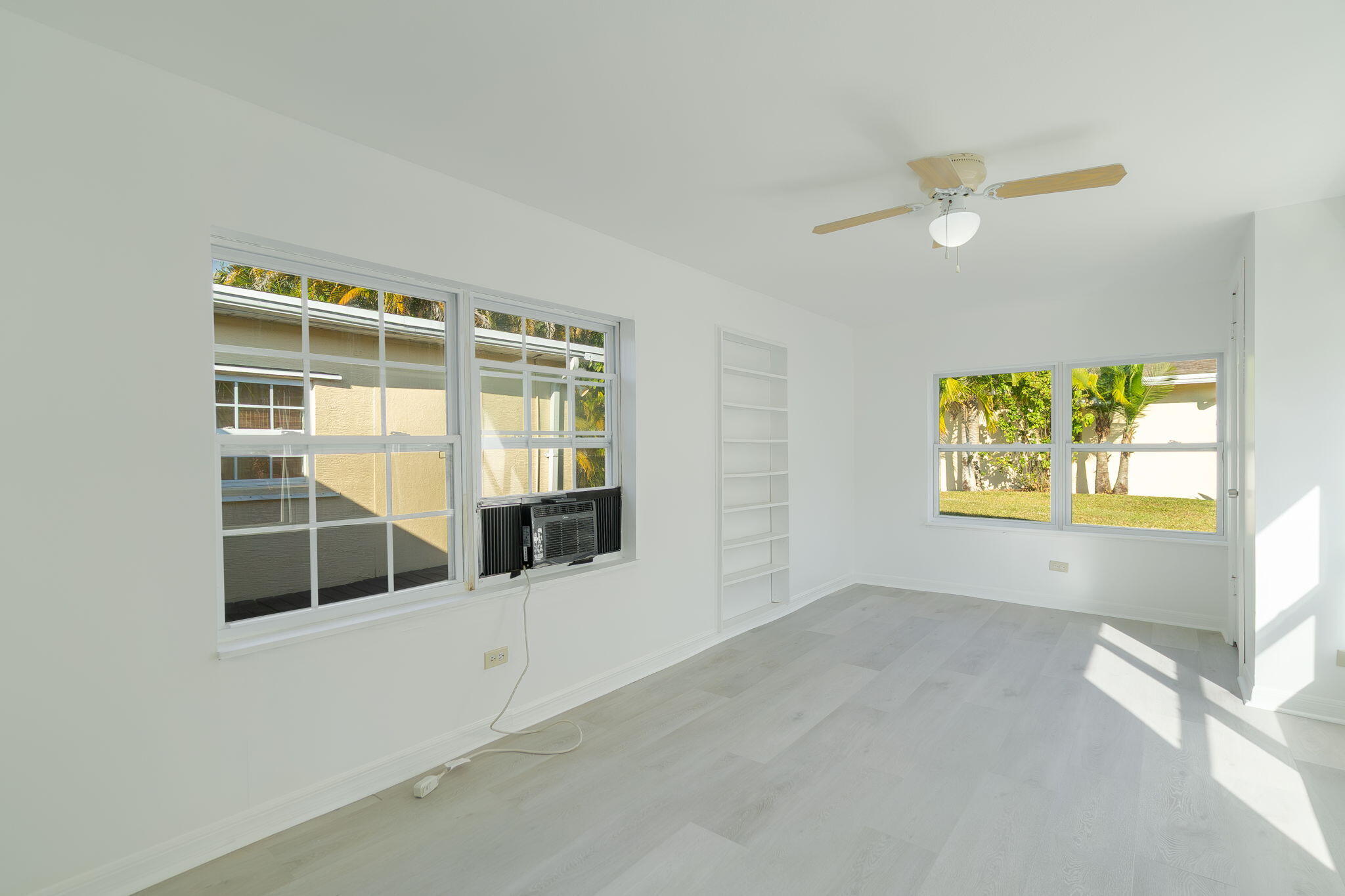 5519 Southeast Normandy Avenue Stuart, FL 34997 - Photo 12 of 38 a view of an empty room with a window