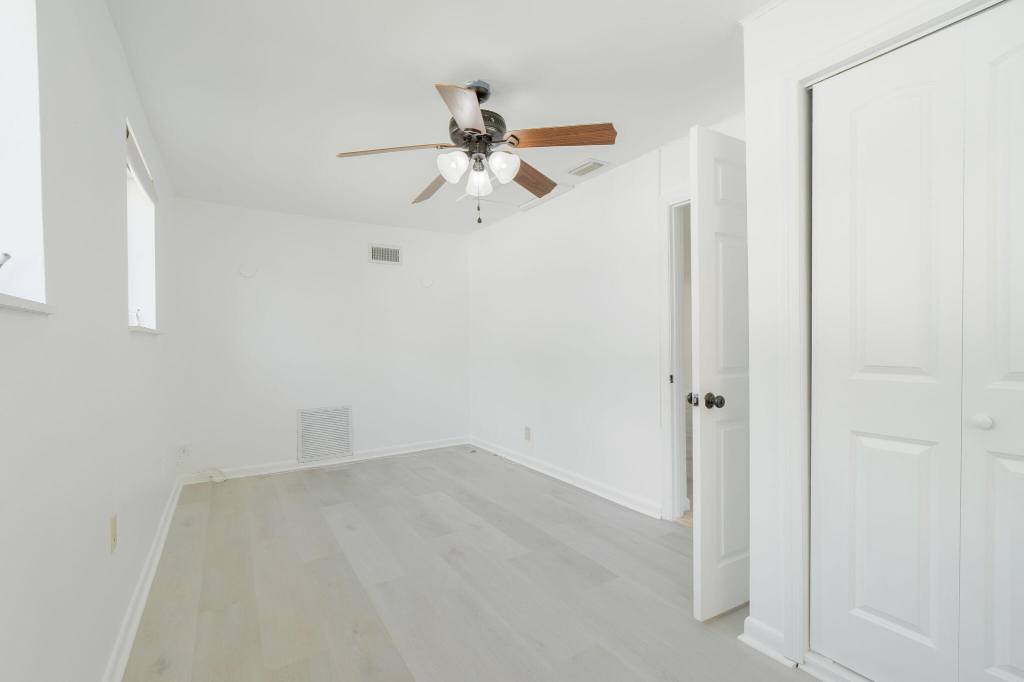 5519 Southeast Normandy Avenue Stuart, FL 34997 - Photo 14 of 38 a view of a room with rack on the wall