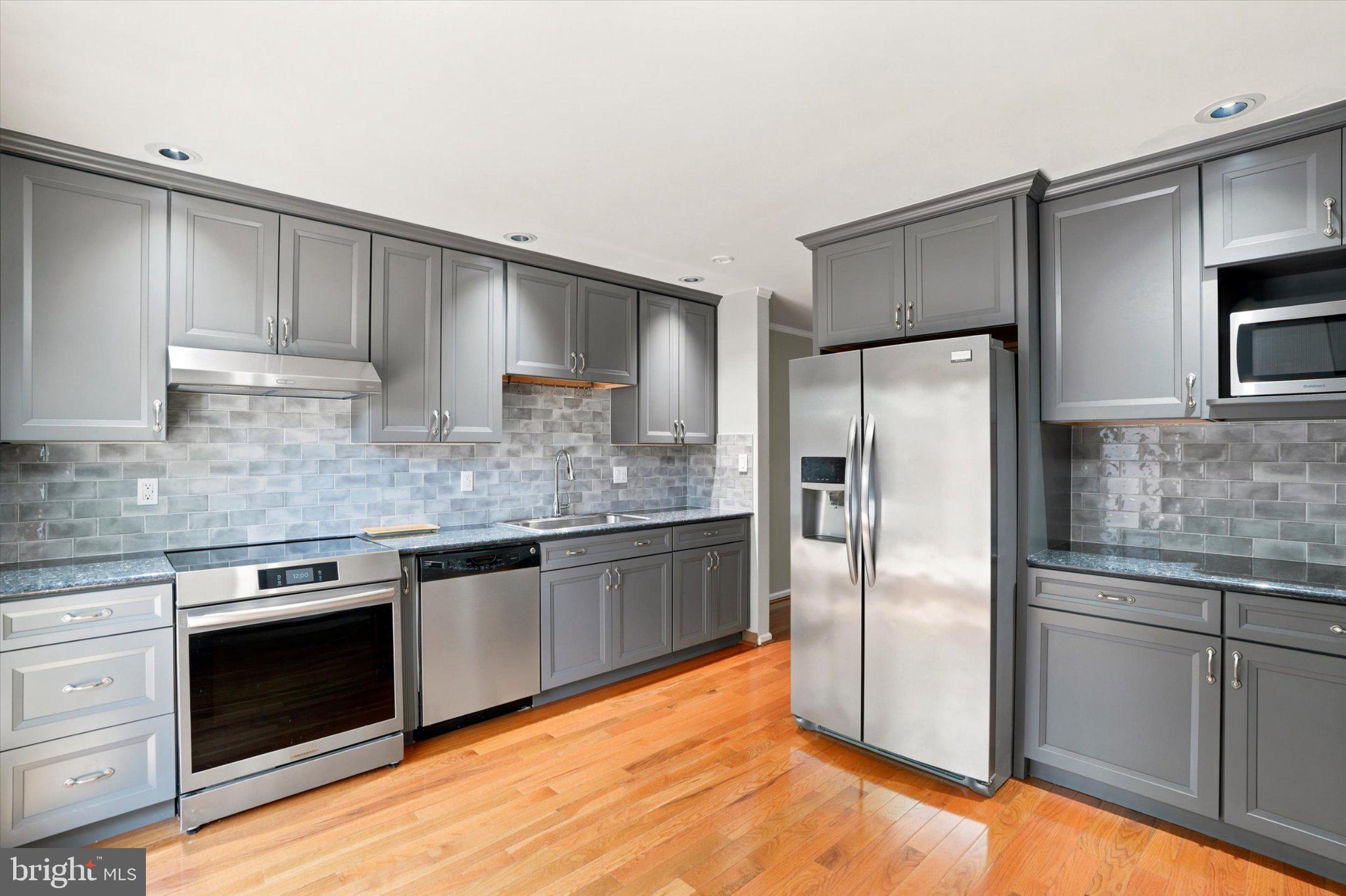 18 Medinah Drive Reading, PA 19607 - Photo 8 of 25 Sleek modern kitchen with stylish finishes.