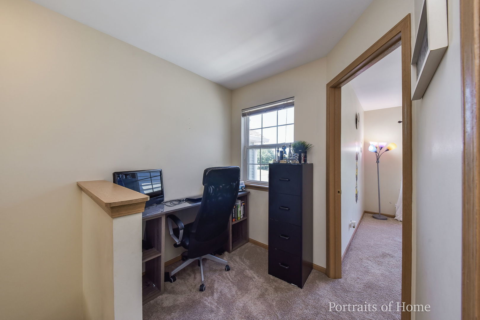 2578 Golf Ridge Circle Naperville, IL 60563 - Photo 11 of 12 a view of a workspace with furniture and a window
