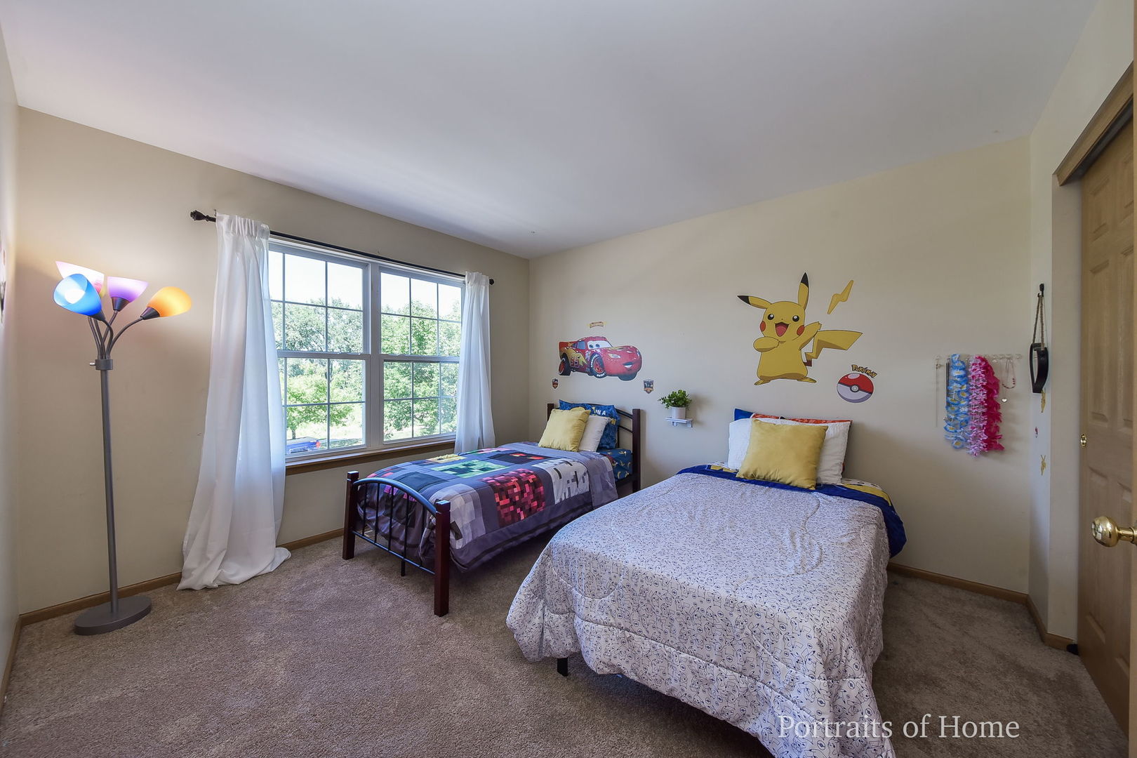 2578 Golf Ridge Circle Naperville, IL 60563 - Photo 9 of 12 a bedroom with two beds and a window