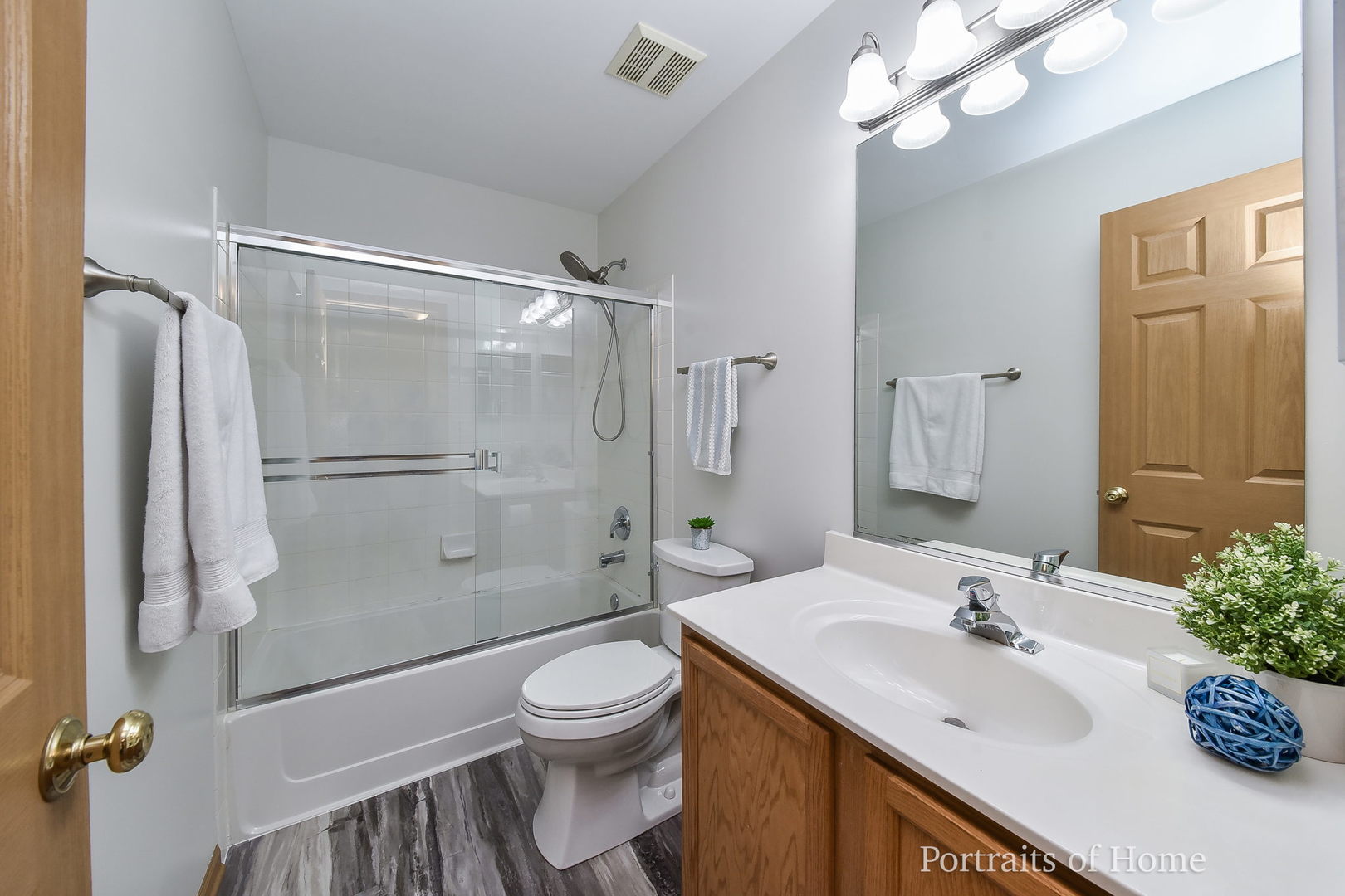 2578 Golf Ridge Circle Naperville, IL 60563 - Photo 10 of 12 a bathroom with a sink toilet and shower