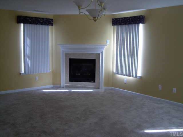 5900 Roteny Court Raleigh, NC 27610 - Photo 6 of 6 beautiful living room w/gas log fireplace