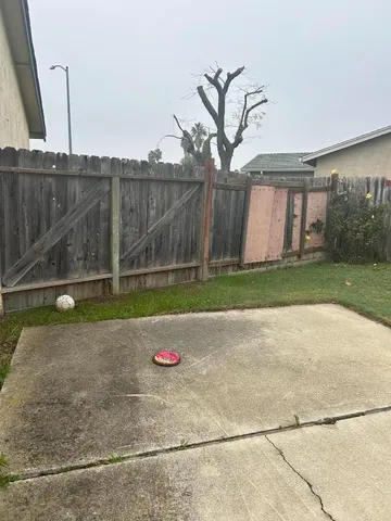 a view of a backyard with a small cabin