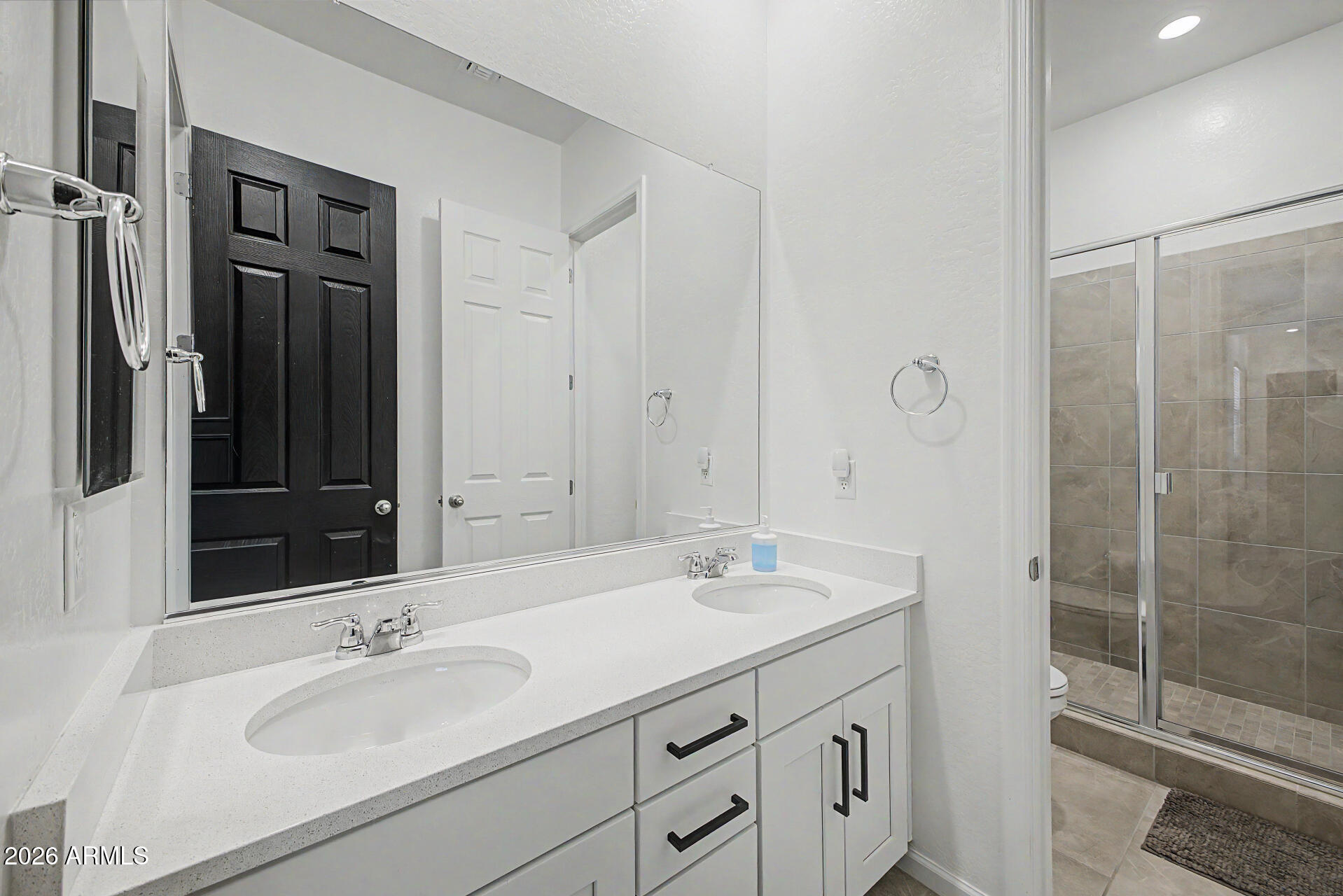 6511 West Steed Ridge Phoenix, AZ 85083 - Photo 25 of 41 a bathroom with a shower sink and mirror
