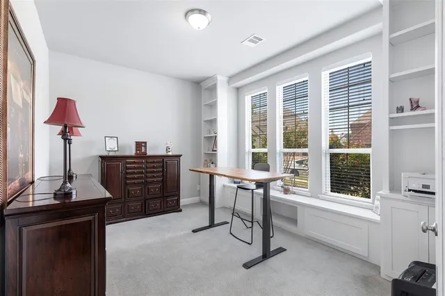 a view of an entryway with wooden floor and stairs