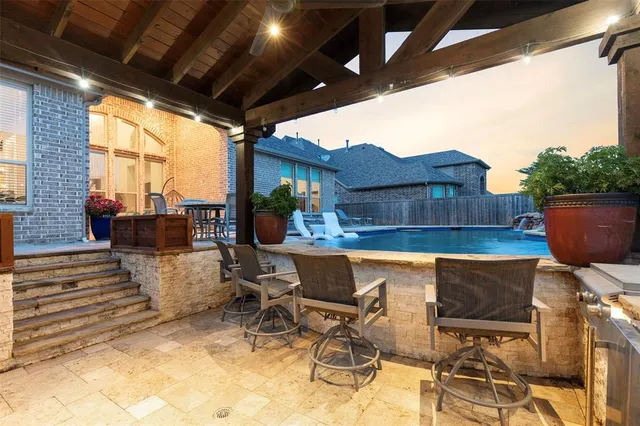 a view of a swimming pool with a garden