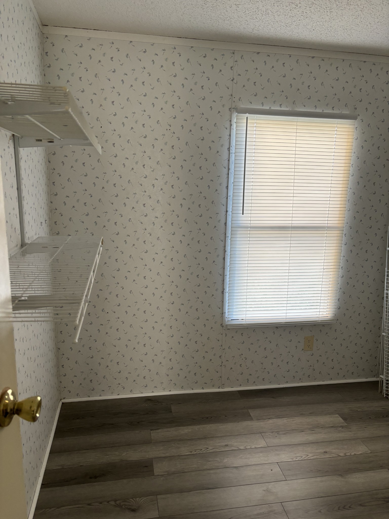 2475 Canoe Branch Road Lebanon, TN 37087 - Photo 20 of 25 a view of an empty room with wooden floor and a window