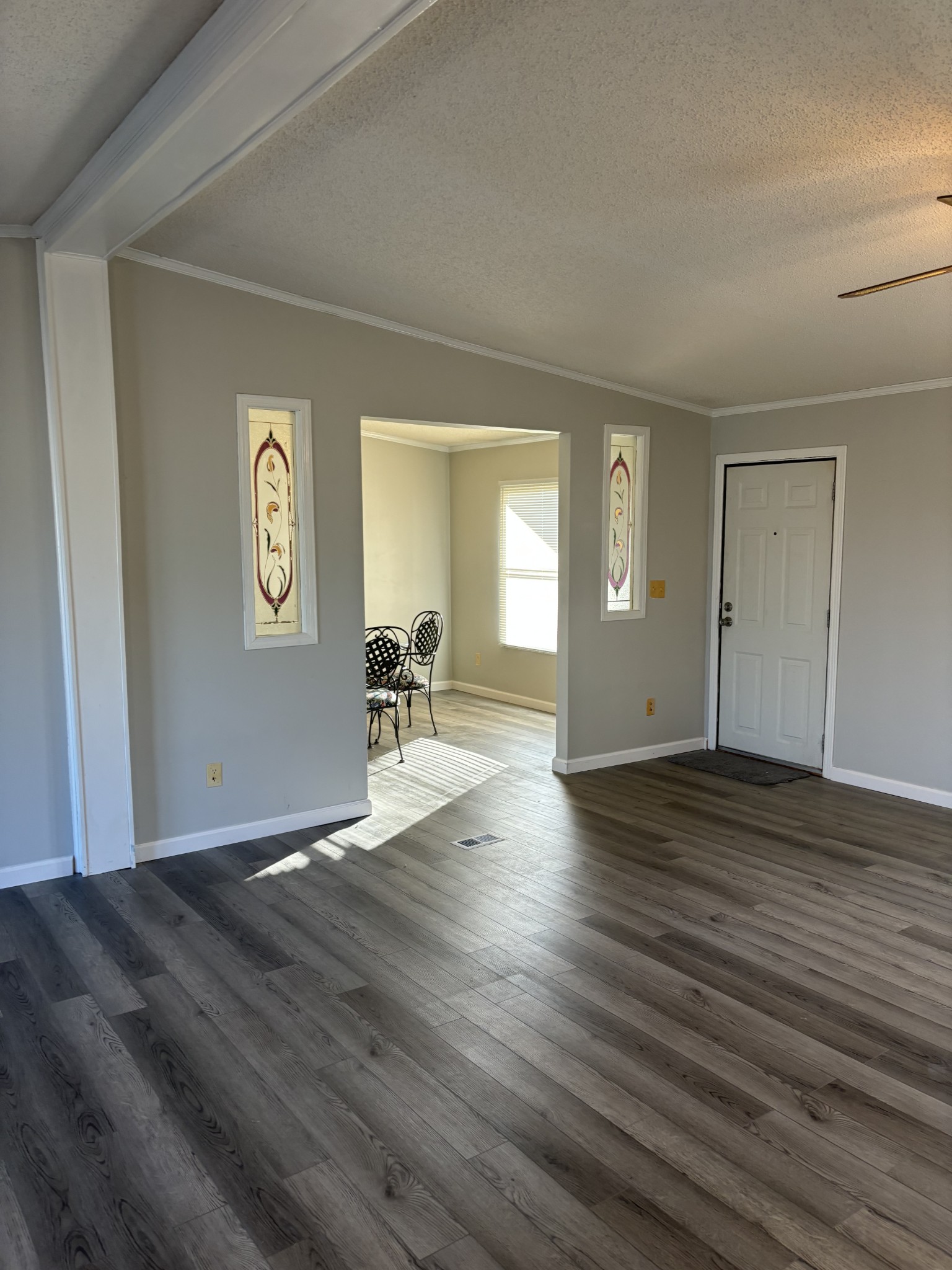 2475 Canoe Branch Road Lebanon, TN 37087 - Photo 7 of 25 a view of a livingroom with wooden floor and furniture