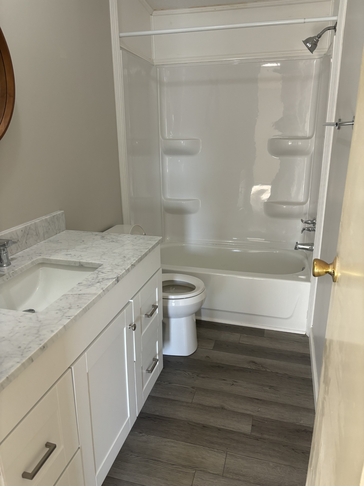 2475 Canoe Branch Road Lebanon, TN 37087 - Photo 10 of 25 a bathroom with a granite countertop sink a toilet and shower