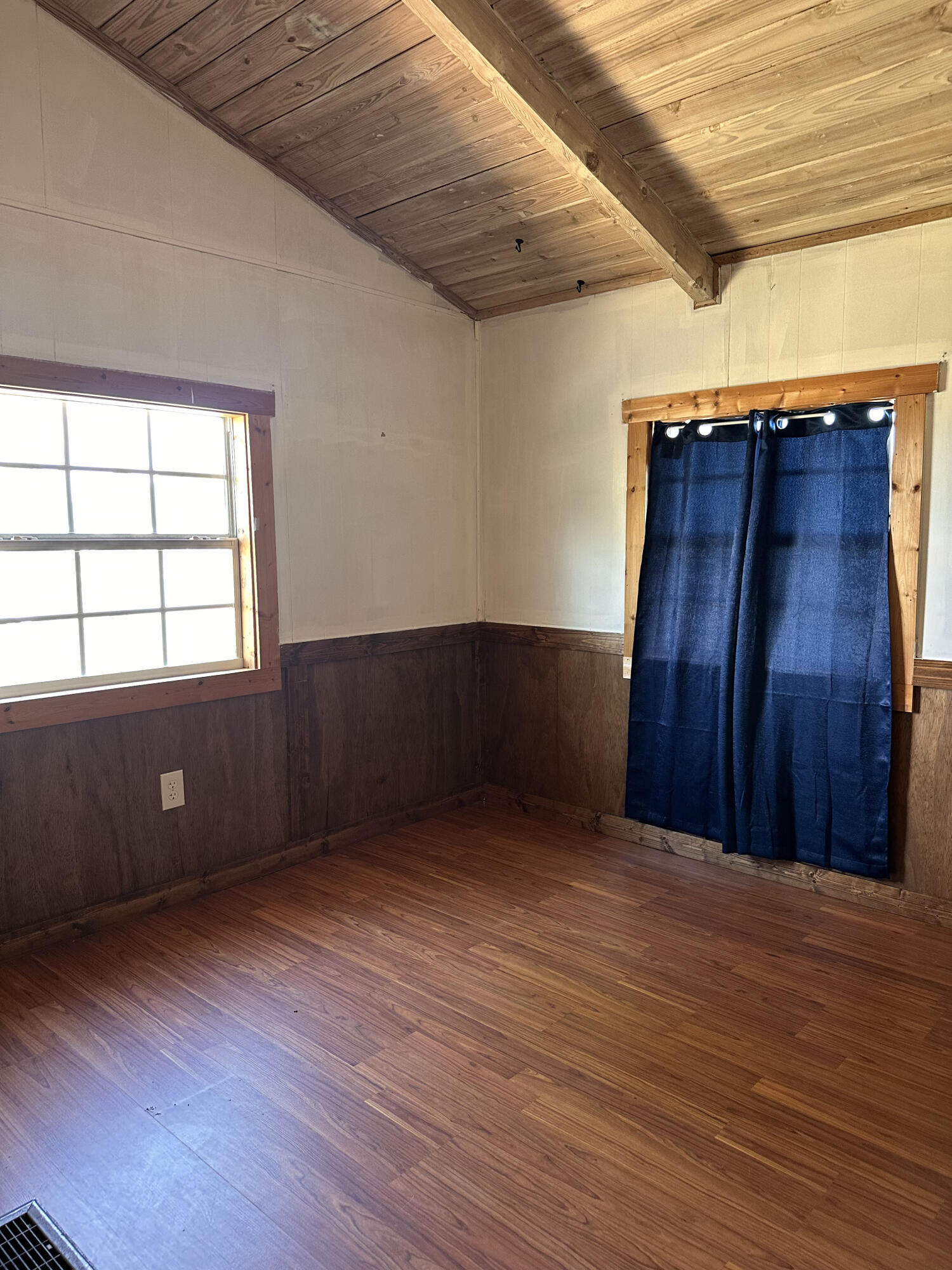 14455 Highway 78 Okeechobee, FL 34974 - Photo 7 of 14 an empty room with wooden floor and windows