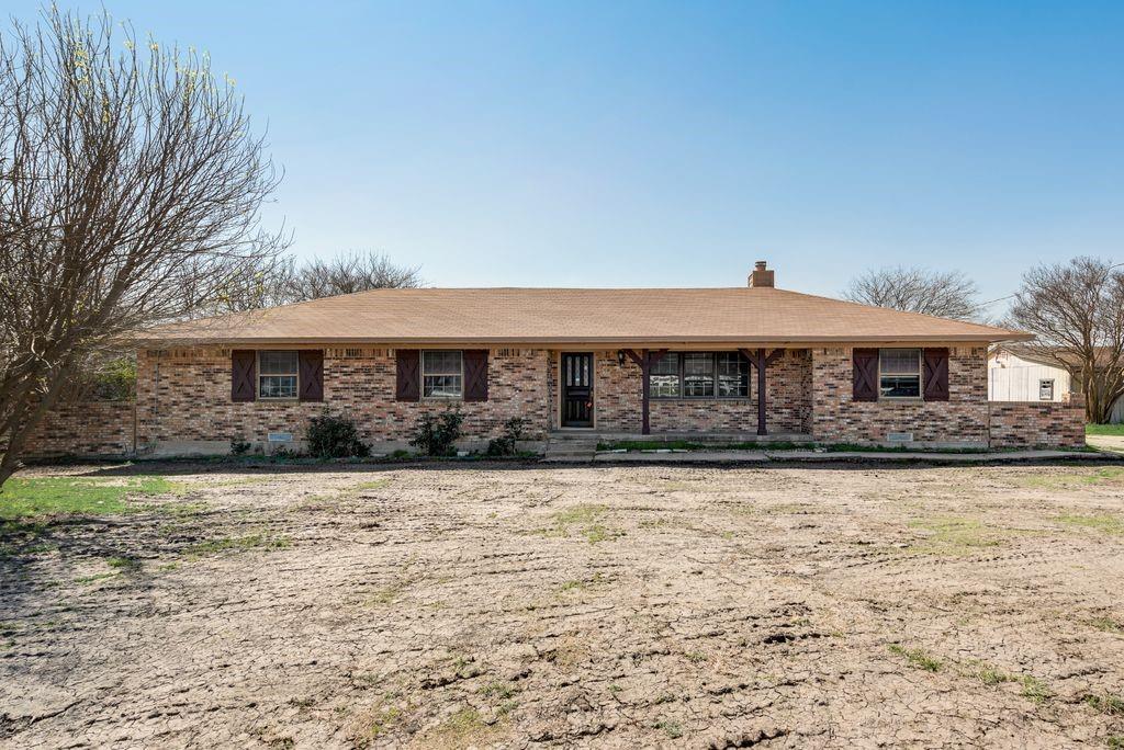 1323 Parker Road Wylie, TX 75098 - Photo 1 of 20 a front view of a house with yard