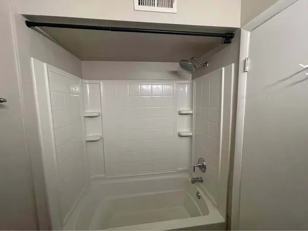 a bathroom with a bathtub