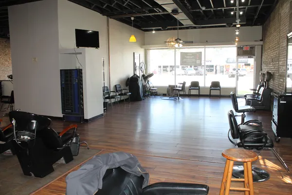 a room with furniture and a flat screen tv