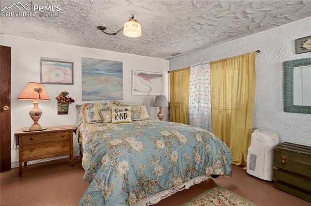 5975 Wellington Road Cascade, CO 80809 - Photo 32 of 32 Apartment bedroom