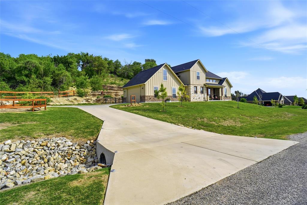 1024 Tex Lane Springtown, TX 76082 - Photo 40 of 40 a front view of a house with a yard