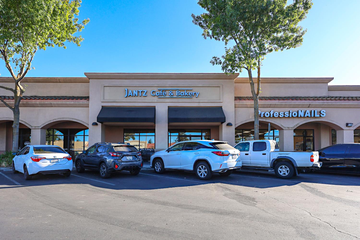 0 Redwood Atwater, CA 95301 - Photo 20 of 31 a building with cars parked in front of it