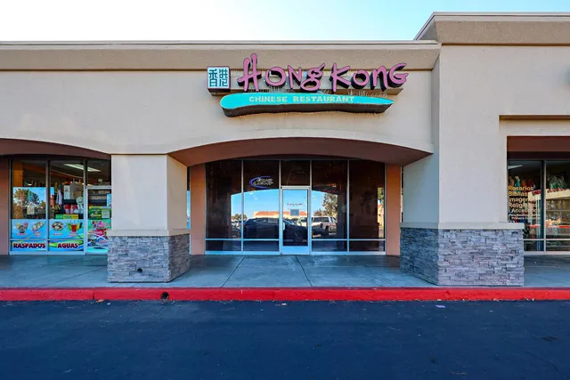 a view of a book shop with a road