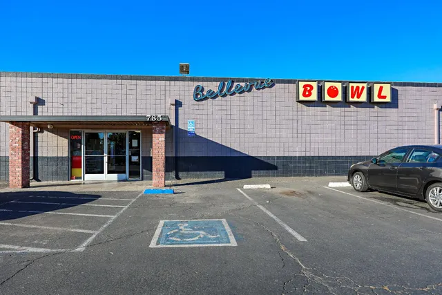 a view of a building with a street