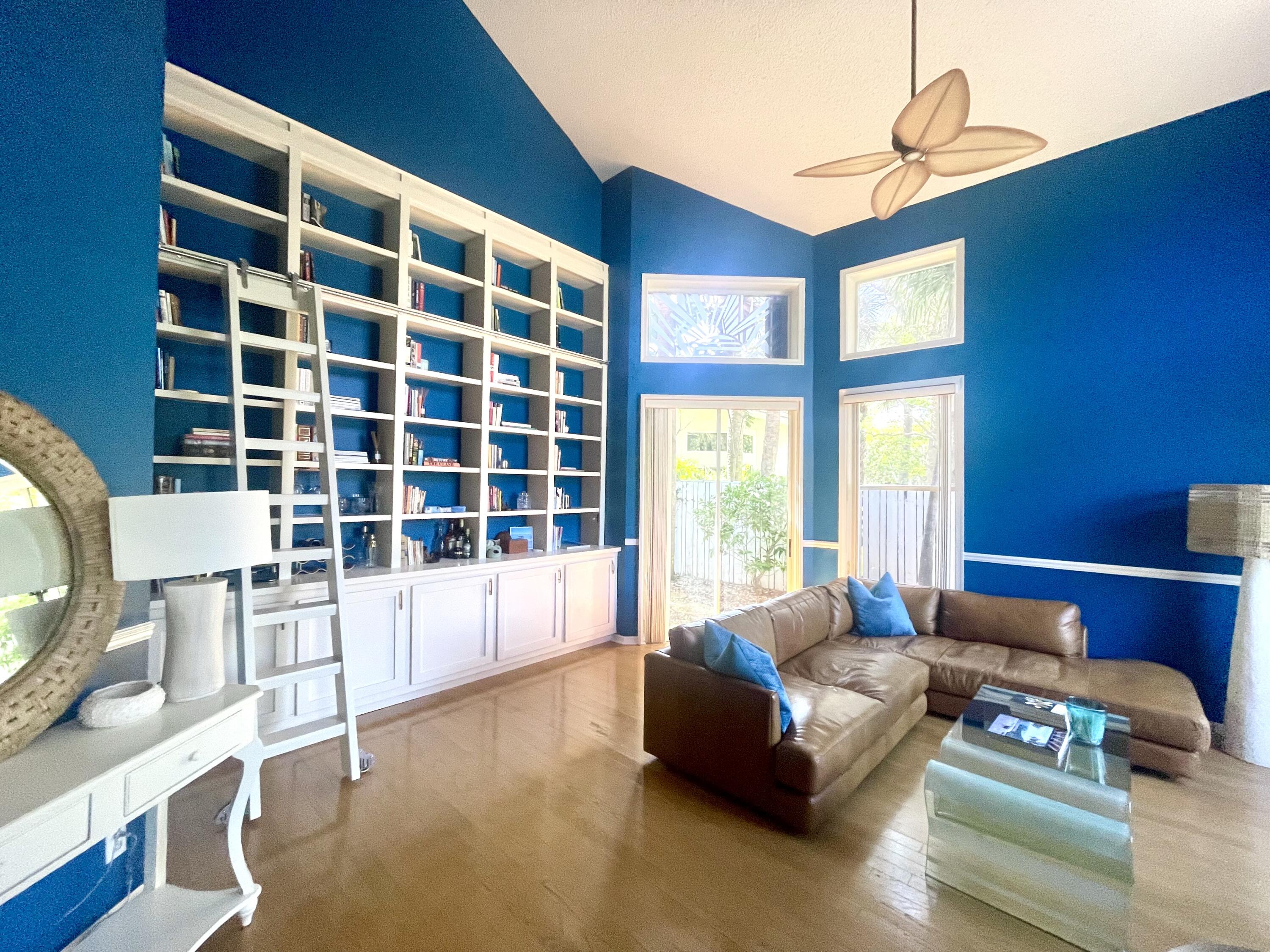 2033 Staysail Lane Jupiter, FL 33477 - Photo 5 of 40 a living room with furniture and a large window