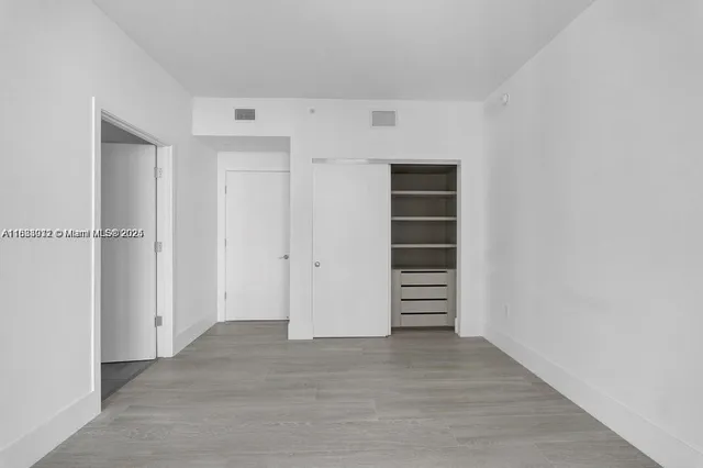 a view of walk in closet with stairs