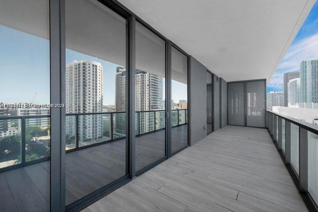 788 Northeast 23rd Street, Unit 1402 Miami, FL 33137 - Photo 32 of 42 a view of hallway with a balcony