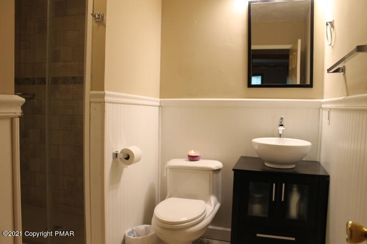 709 Edgewood Road Tobyhanna, PA 18466 - Photo 24 of 55 a bathroom with a sink a toilet and shower