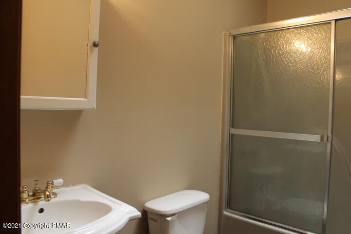 709 Edgewood Road Tobyhanna, PA 18466 - Photo 32 of 55 a bathroom with a sink and a toilet