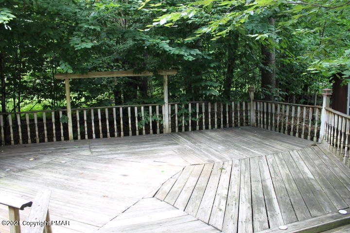 709 Edgewood Road Tobyhanna, PA 18466 - Photo 47 of 55 a view of backyard with deck and wooden floor