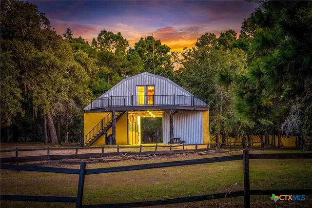 a view of swimming pool with trees in the background
