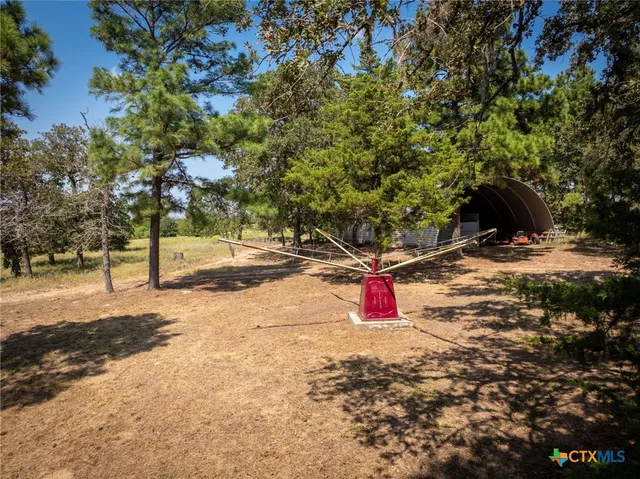a flag is sitting in the middle of a yard