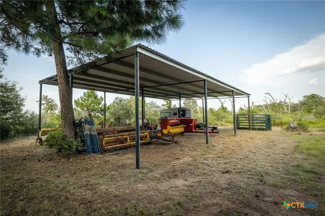 a view of a bench in a backyard