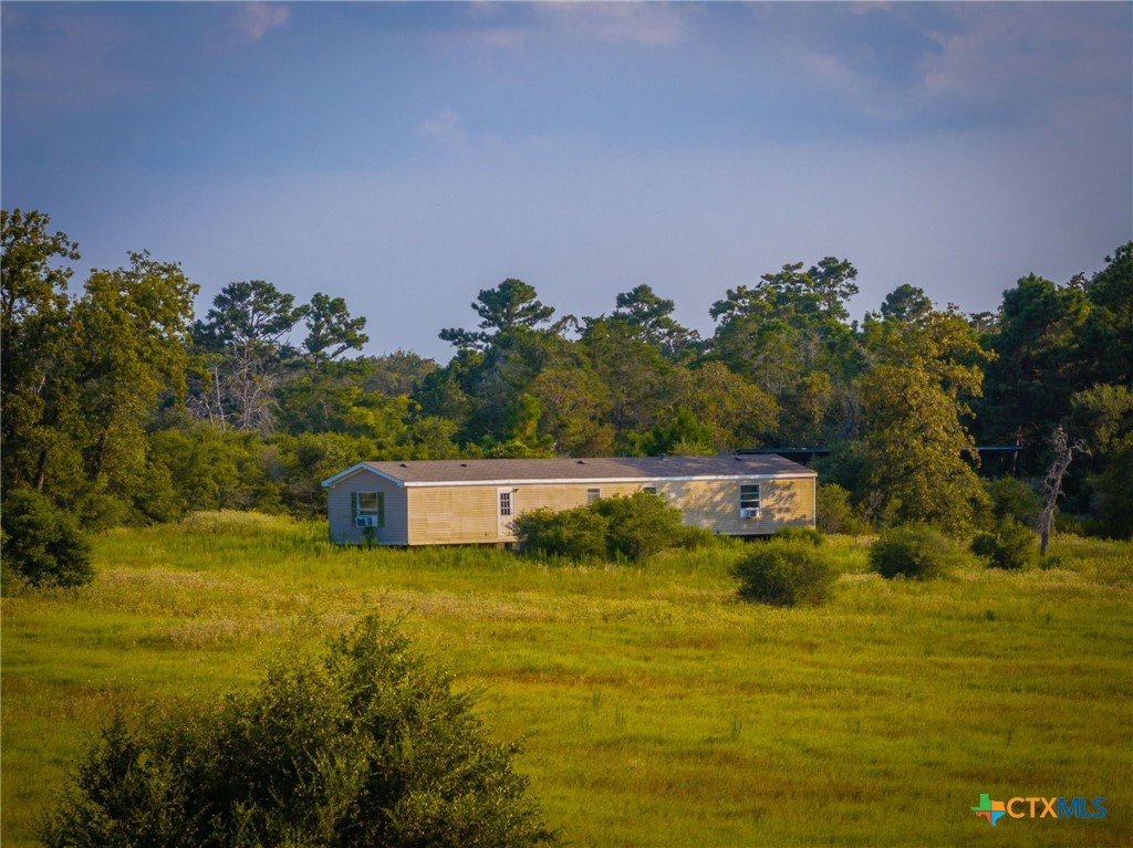 1031 Angel Lake Estates Road Alleyton, TX 78935 - Photo 29 of 47 a view of a lake with houses