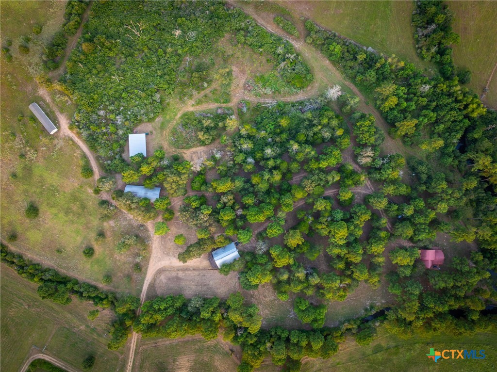 1031 Angel Lake Estates Road Alleyton, TX 78935 - Photo 43 of 47 an aerial view of residential house with outdoor space and trees all around