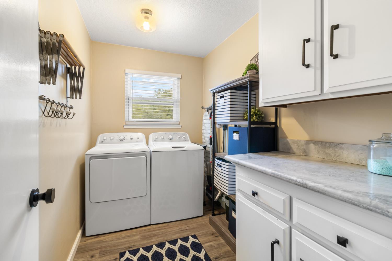22800 Latrobe Road Plymouth, CA 95669 - Photo 36 of 81 a utility room with closet dryer and washer