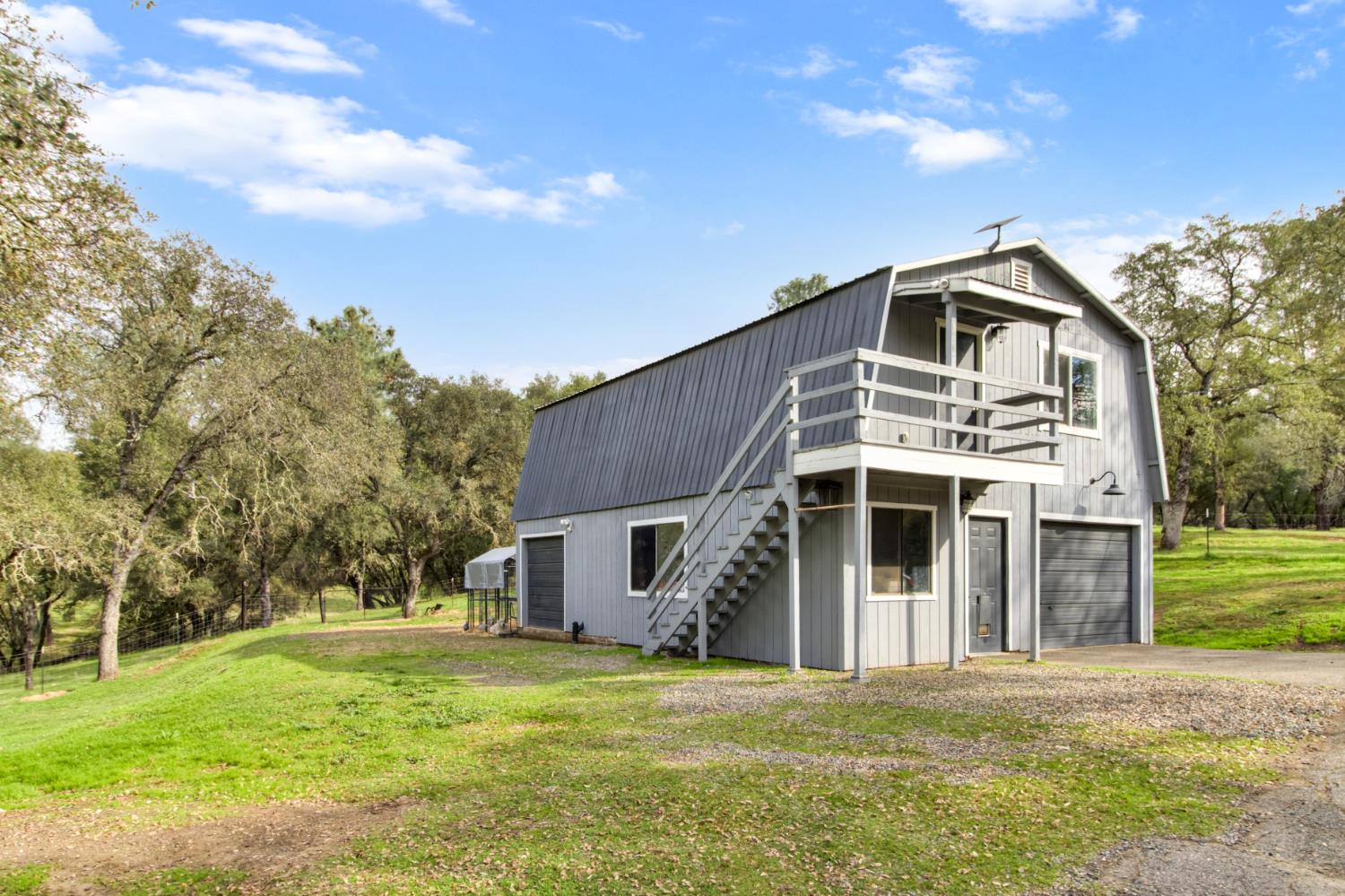 22800 Latrobe Road Plymouth, CA 95669 - Photo 45 of 81 a front view of a house with a garden