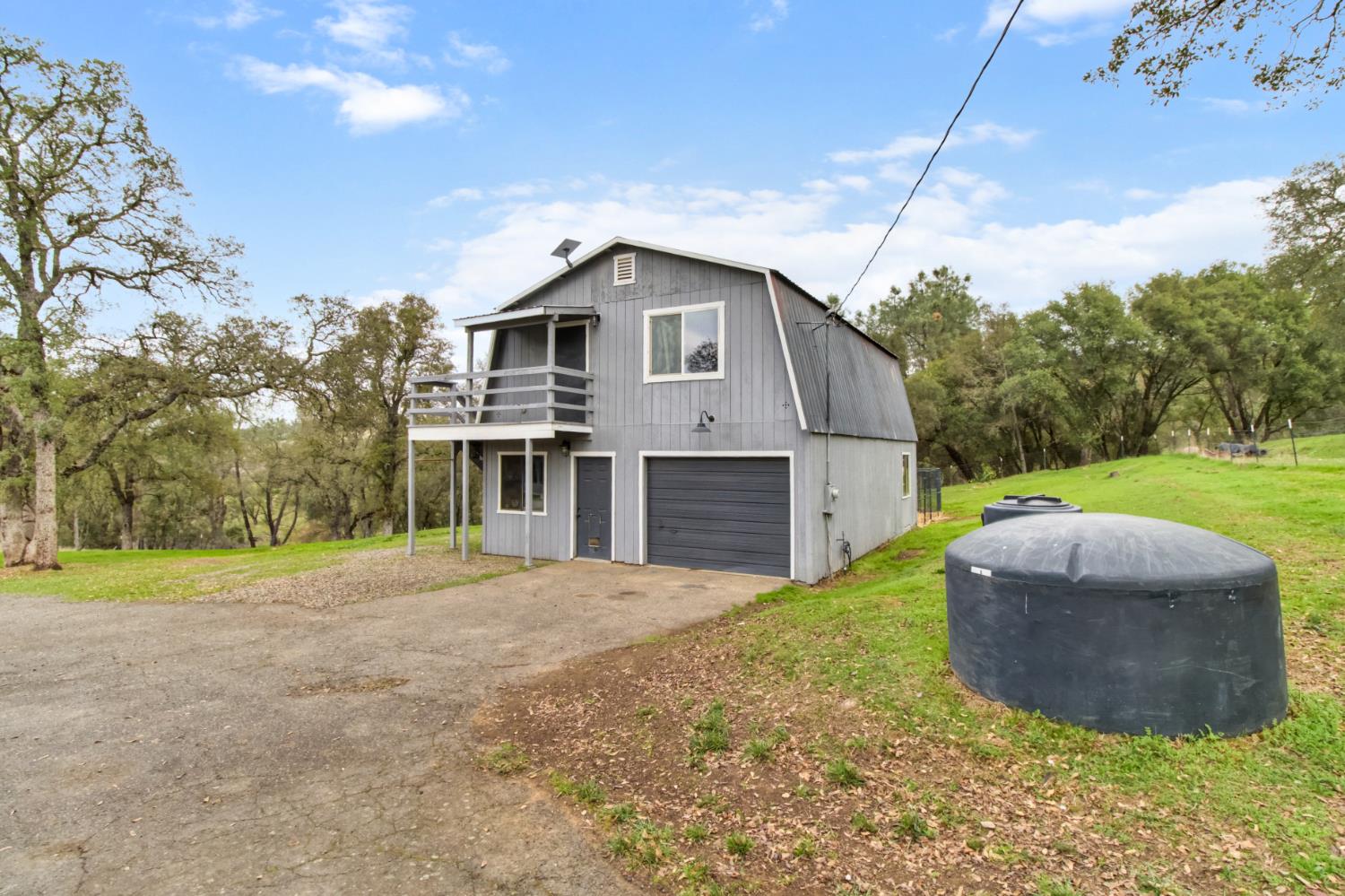 22800 Latrobe Road Plymouth, CA 95669 - Photo 53 of 81 a front view of a house with garden