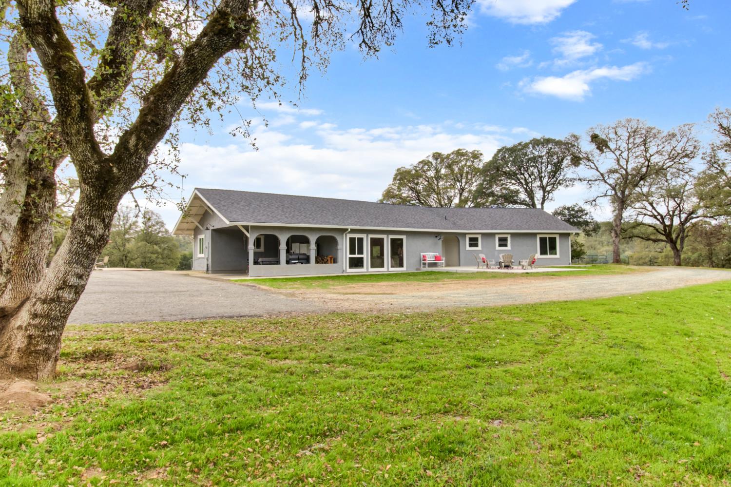 22800 Latrobe Road Plymouth, CA 95669 - Photo 6 of 81 a front view of a house with a yard