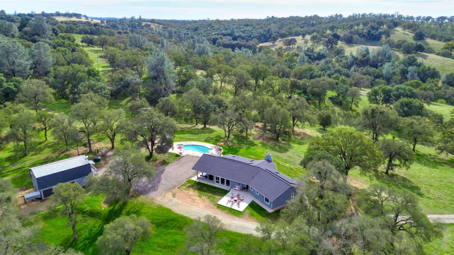 22800 Latrobe Road Plymouth, CA 95669 - Photo 71 of 81 an aerial view of a house with pool