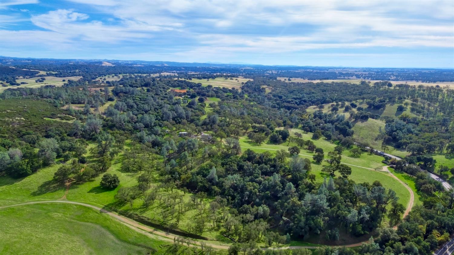 22800 Latrobe Road Plymouth, CA 95669 - Photo 78 of 81 an aerial view of residential houses with outdoor space and trees