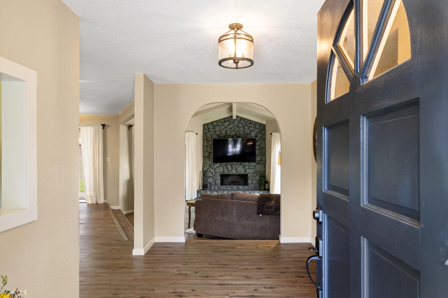 22800 Latrobe Road Plymouth, CA 95669 - Photo 8 of 81 a view of living room with furniture and flat screen tv